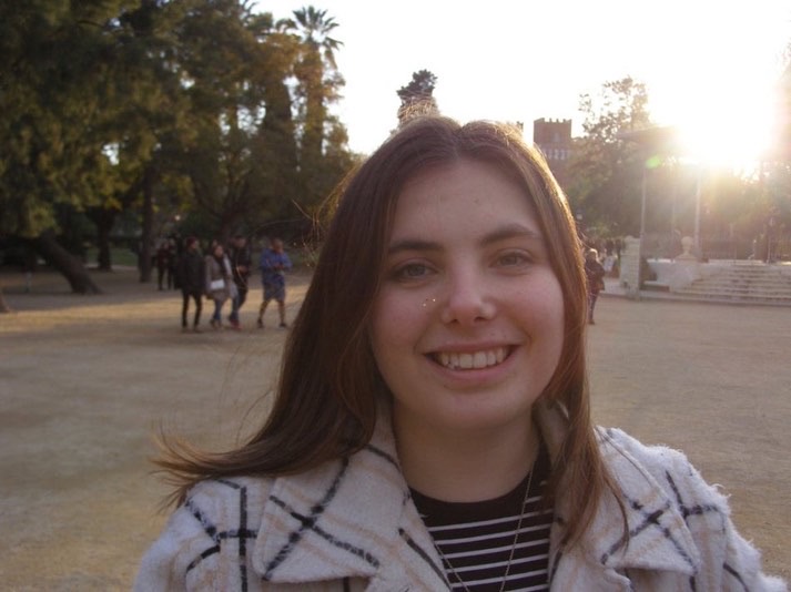 Laura smiling in the sun